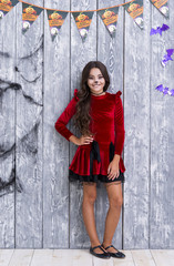 Fototapeta premium Full shot cute girl posing for halloween