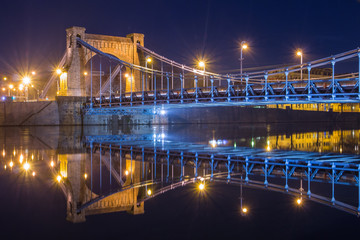 Fototapeta na wymiar View of the Grunwald Bridge in Wroclaw at night. Poland