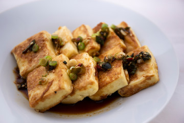 Fried Tofu with Soy Sauce and chillies which is called Dubu Jorim in Korea