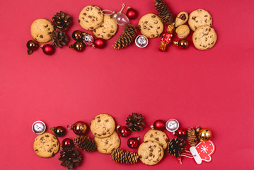 Red Christmas Background with Cookies Red Silver and Brown Christmas Balls and Cones Christmas...