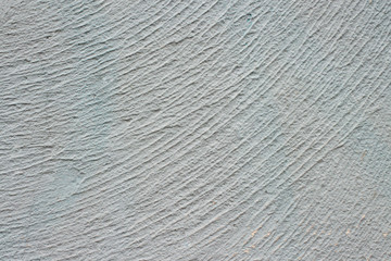 Background abstract texture blue painted  decorative plaster wall with lines pattern 