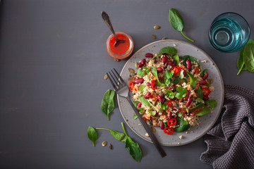 healthy bean and quinoa salad with spinach, chili
