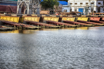 Naklejka premium Elevating complex for transshipment of grain and oilseeds as part of a reloading terminal. Transportation of agricultural products and port cranes