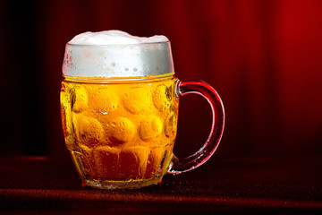 Glass of beer with drops of water