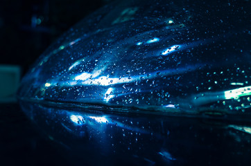 Blue reflections and raindrops