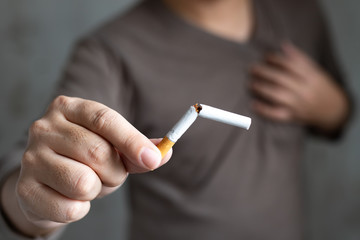 man holding a cigarette