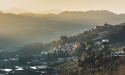 Fototapeta na wymiar Small village and Terraced rice fields of YuanYang , China in the morning