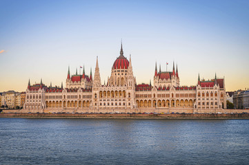 Fototapeta premium Evening View of Budapest Parliament at sunset, Hungary. Wonderful Cityscape with Colorful sky. Popular travel destination
