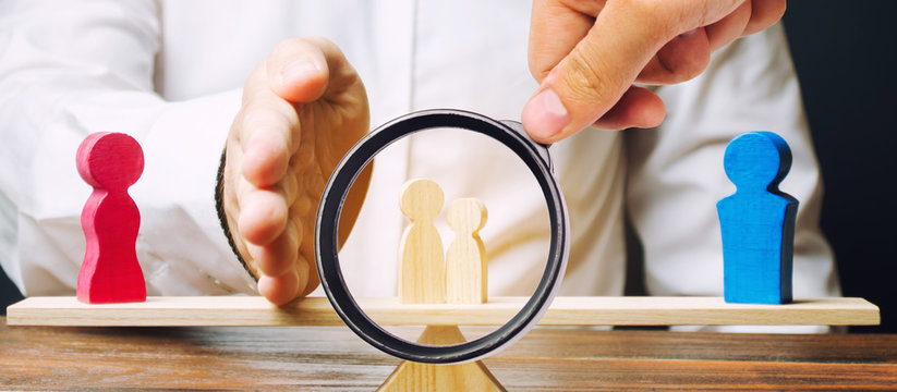 A magnifying glass looks at a man with a palm separates children from mother to father. Depriving a mother of parental rights and transferring children under guardianship. Child custody after divorce.