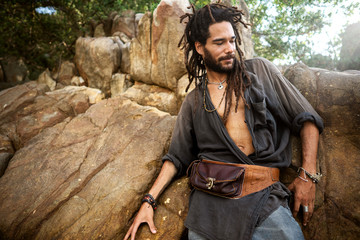 handsome guy with dreadlocks on an island in thailand