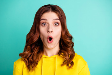 Close up photo of excited ecstatic speechless youngster unable to believe sales and discounted goods started isolated over teal vivid color background