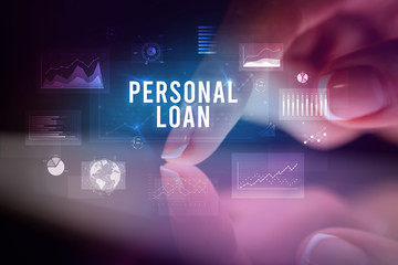 Finger touching tablet with charts and PERSONAL LOAN inscription, business concept