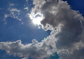 clouds blue sky sun ray
