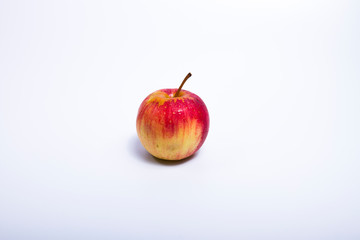 Apple is a very good fruit if you love fruit. But this red apple has traces of puncture insects on the White Background