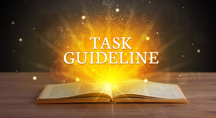 TASK GUIDELINE inscription coming out from an open book, educational concept