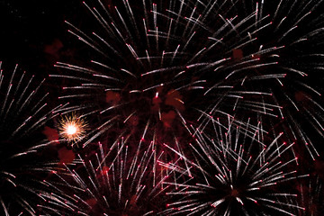 Naklejka premium Colorful fireworks in the sky at night as background