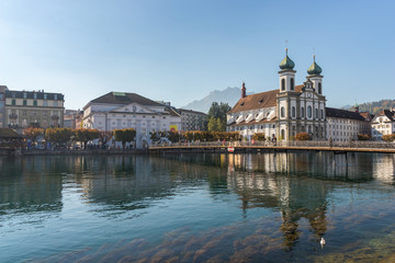Fototapeta na wymiar Jesuitenkirche or Jesuit church along Reuss river in Luzern or Lucerne in Switzerland