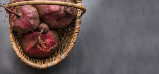 Fresh organic beetroot in a wicker basket, banner