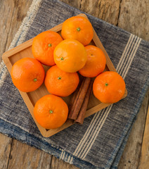 Ripe mandarine citrus . tangerine mandarine orange on wooden background.