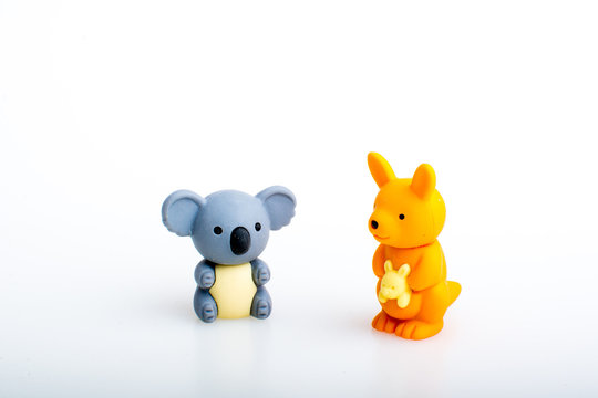Koala and kangaroo rubber toys, cute animal shaped rubber doll isolated in white background. 