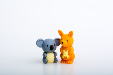 Koala and kangaroo rubber toys, cute animal shaped rubber doll isolated in white background. 