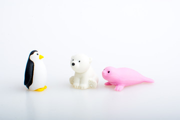 penguin, seal and polar bear rubber toys, cute animal shaped rubber doll isolated in white background. 