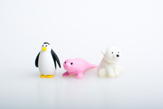 penguin, seal and polar bear rubber toys, cute animal shaped rubber doll isolated in white background. 