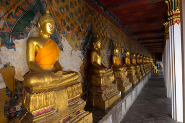 Lined Golden Buddha Statues In Wat Arun