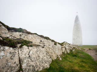 The Beacon at Baltimore in Ireland with fog