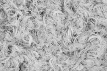White goose feathers and fluff from pillows texture