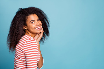 Close up profile photo of amazing pretty dark skin lady with adorable smile wearing casual white red striped sweater isolated pastel blue color background