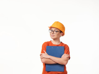 beautiful foreman girl in a yellow helmet with a blue folder on a white background