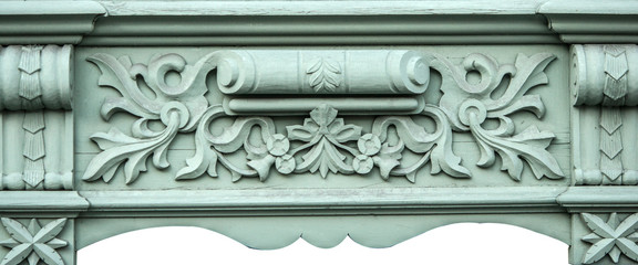 Vintage carved wooden decoration frequently used on windows in urban buildings.