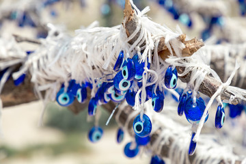 A nazar is an eye-shaped amulet believed to protect against the evil eye. A lot of nazars on the...