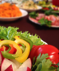 Tomato and cucumber salad with lettuce