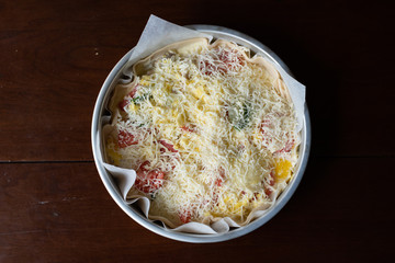 Quiche on Solid Wooden Backdrop