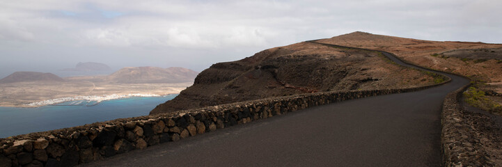 Empty winding road with no people on Lanzarote, Canary island