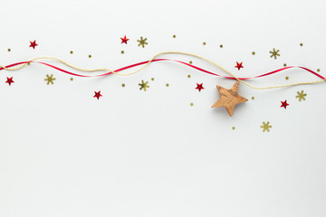 Christmas composition. star ribbon robe top view background with copy space for your text. Flat lay.