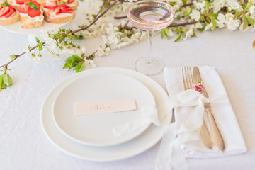 Dishes and cutlery, boho wedding table setting