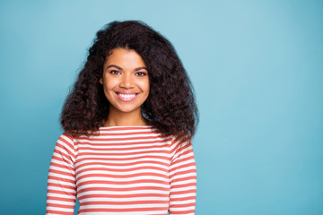 Close-up portrait of her she nice pretty attractive lovely cute cheerful cheery wavy-haired girl wearing striped pullover isolated over blue turquoise pastel color background