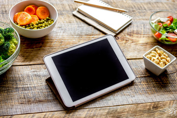 concept diet and tablet with vegetables mock up