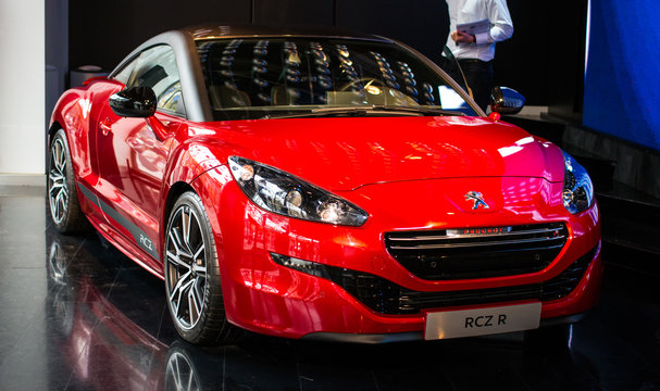 Paris,France Dicember 02 2013:The RCZ-R will have a turbocharged 1.6l engine capable of producing 270bhp and 330NM of torque,allowing it a 0-62 time of 5.9 seconds and a top speed limited to 155 mph. 