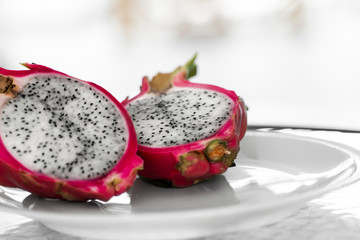 Dragon fruit. Vibrant Dragon Fruit on white background. Sliced white dragon fruit or pitaya on...