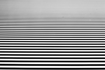 parallel alternating pattern of white and shadows