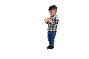 Attractive Asian little boy photographer wearing striped shirt standing isolated over white background, Taking a picture with toy photo camera, Two year one month old