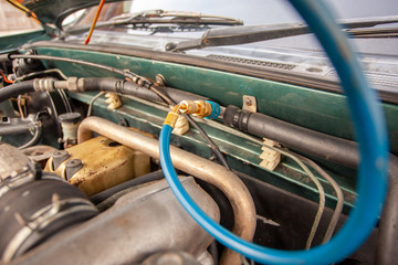 car air conditioner system in car garage, Car air conditioner check service, leak detection, fill...