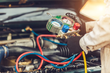 car air conditioner system in car garage, Car air conditioner check service, leak detection, fill...