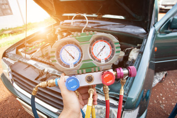 car air conditioner system in car garage, Car air conditioner check service, leak detection, fill...