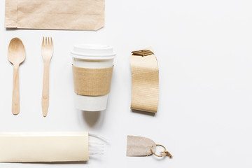 paper bags and plastic cup for take away set top view space for text