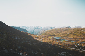 Naklejka premium Beautiful scenic view of massive scandinavian mountains at autumn season.